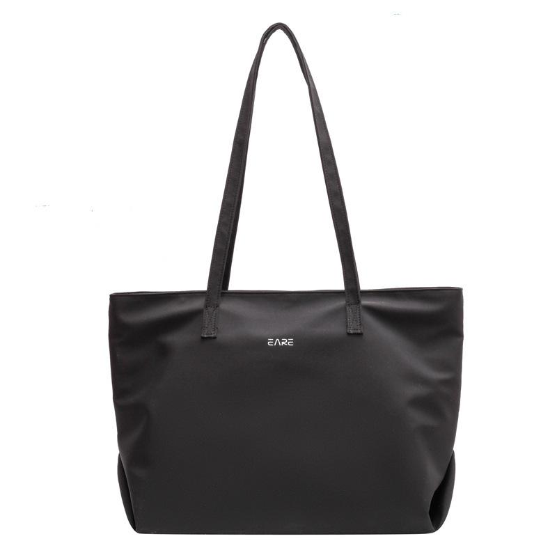 Mens Totes | Bold East/West shopping bag in grained leather Noir